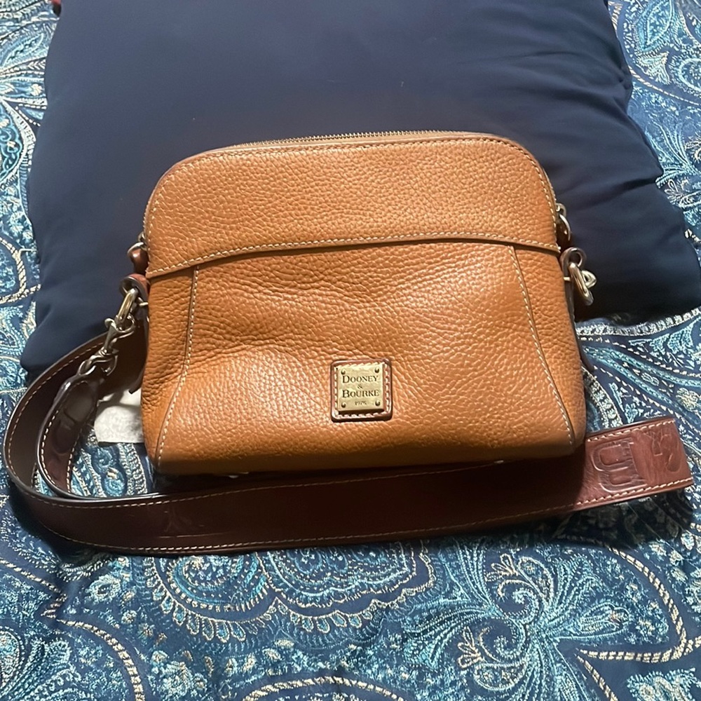 Gently used crossbody with Rooney and Burke leather guitar strap